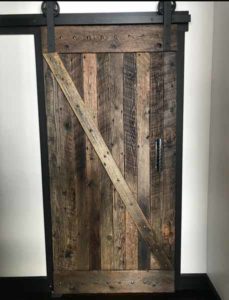 Metal Railings and Barnwood Doors from Rustic By Design